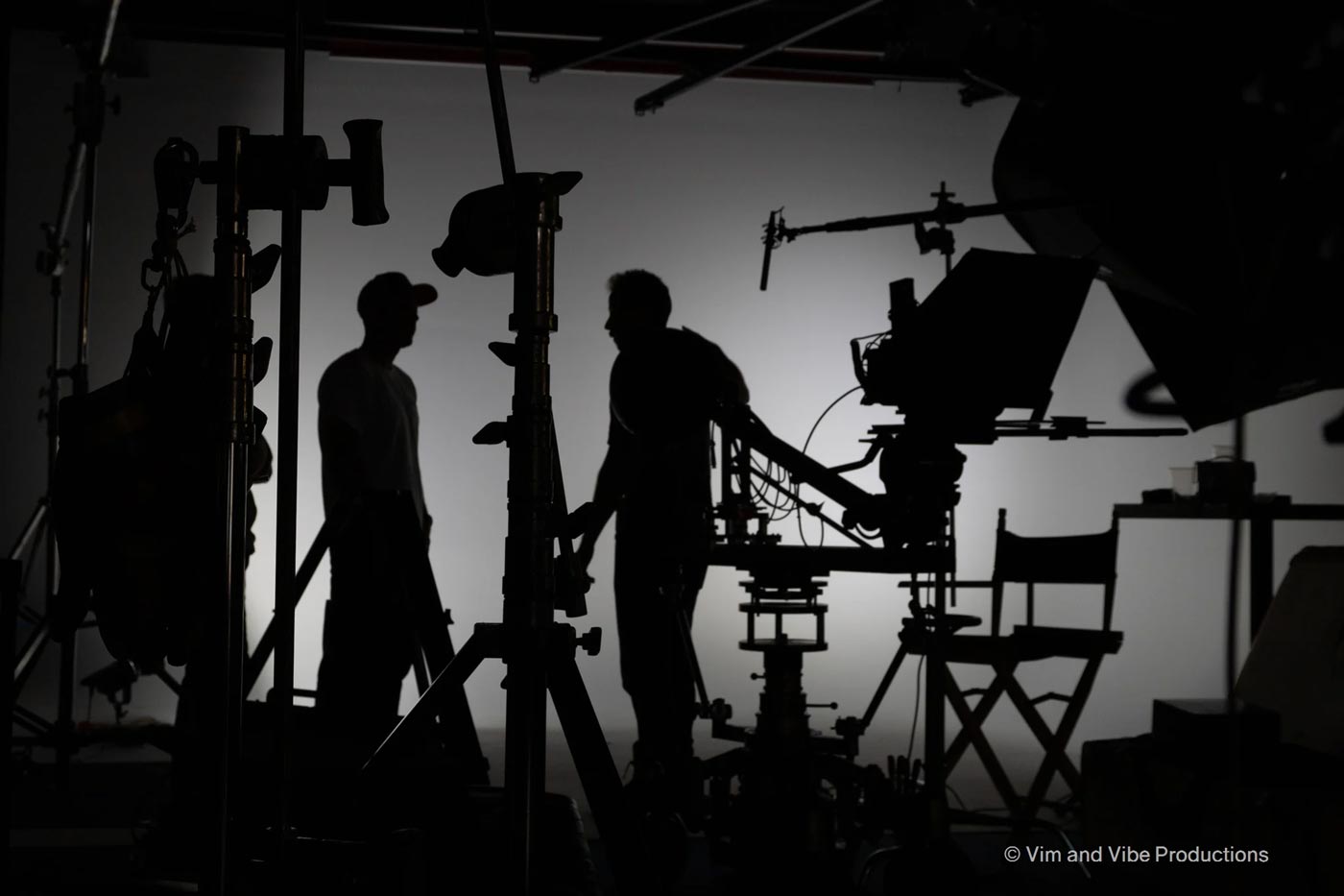 silhouette of video production cast behind the scenes